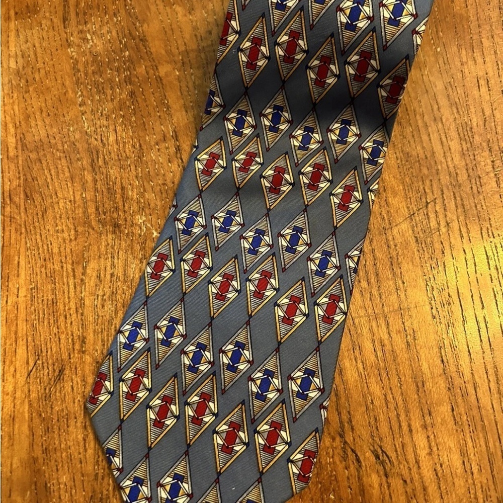 Christian Dior 100% Imported Silk Geometric Patterned Tie in Red, Blue, and Gold